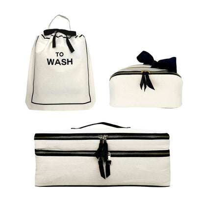 Bag-all cream Weekender gift set including three stylish laundry and beauty cases with black accents and ribbons