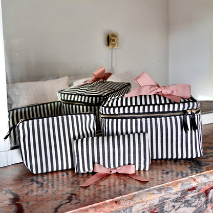 Bag-all striped 3-pack travel and makeup organizers with pink bows, stylish and functional for everyday use.