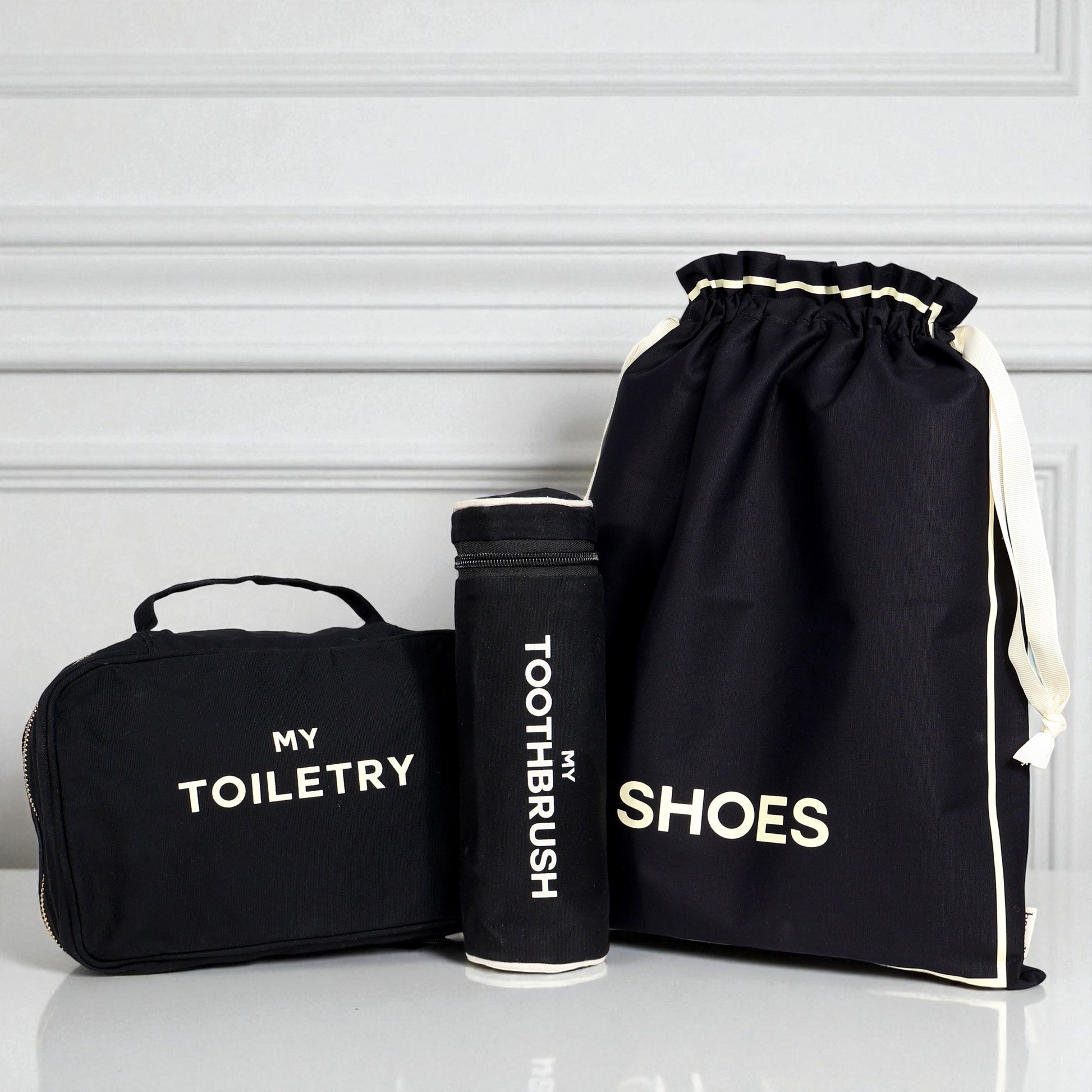 Black 3-pack packing and toiletry organizers for travel essentials by Bag-all with labeled compartments for shoes toothbrush and toiletries