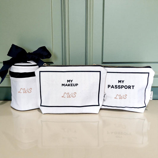 Bag-all cream travel organizers set including passport, liquid, and makeup pouches for stylish carry on essentials organization