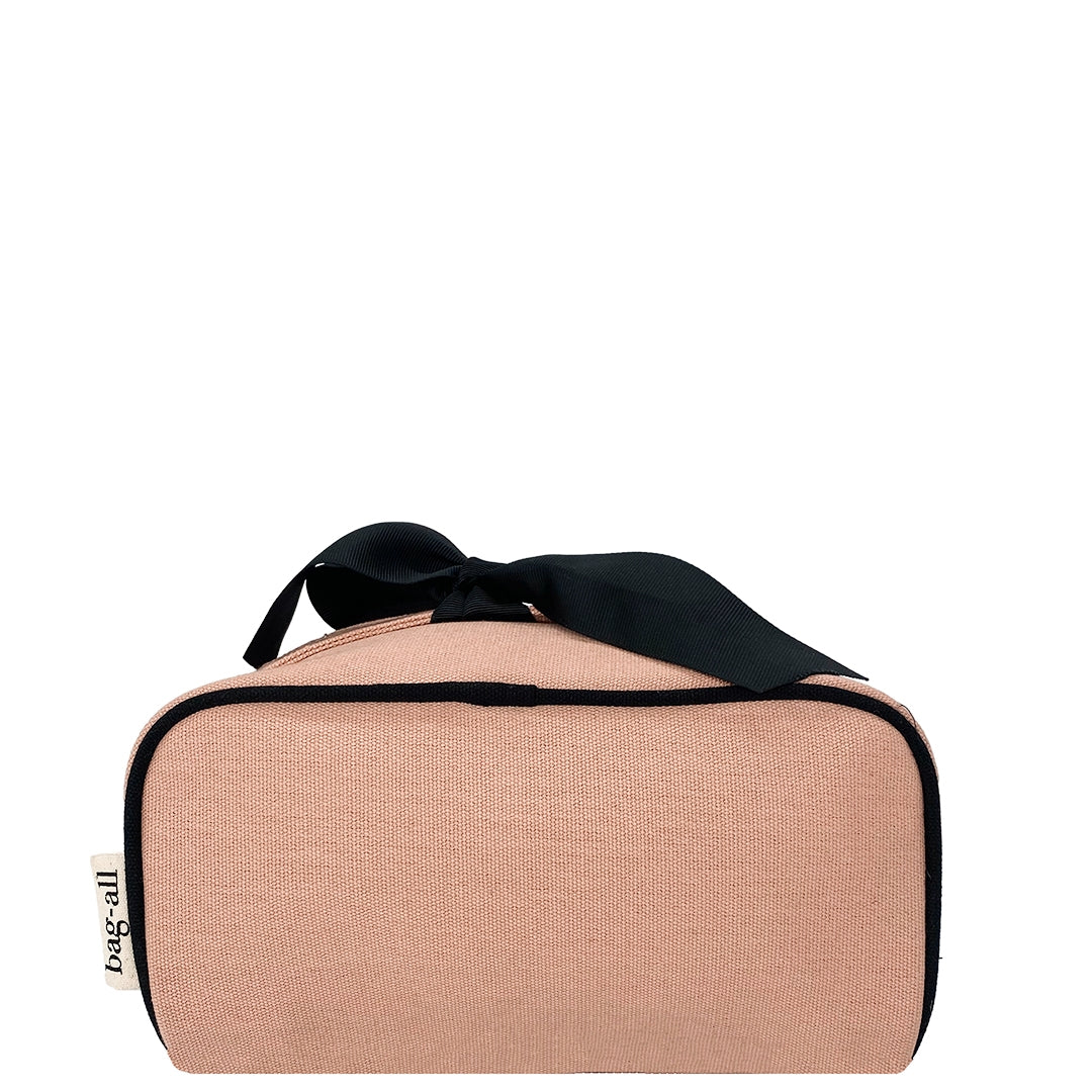Bag-all pink cotton cosmetic case with black bow detail - stylish travel makeup organizer for toiletries and beauty essentials