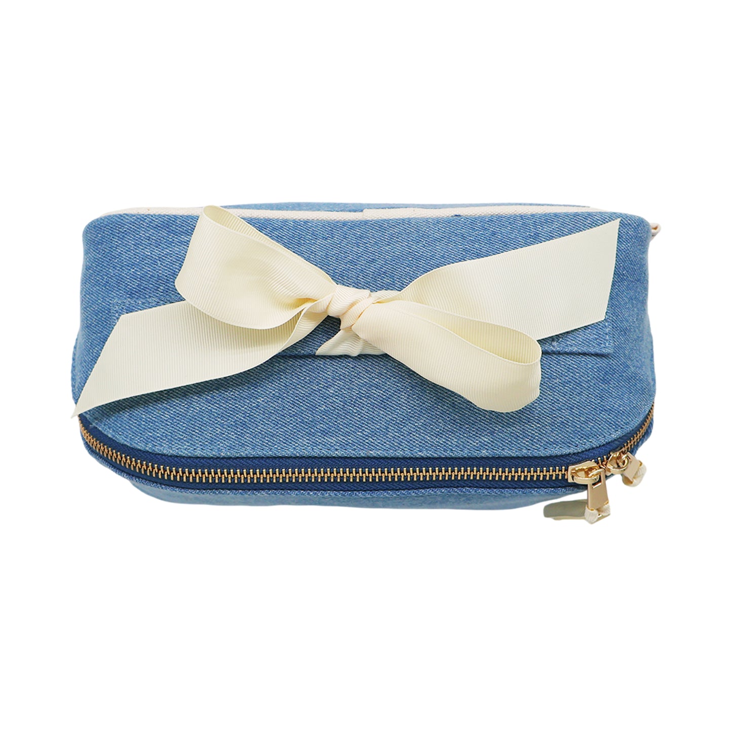 Bag-all expandable organizing makeup bag in denim with gold zipper and cream grosgrain ribbon detail for stylish storage