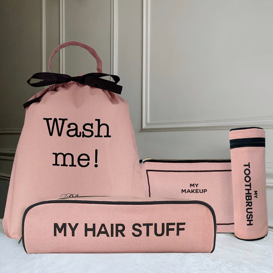 Bag-all pink cotton travel organizer set including Wash Me laundry bag, My Hair Stuff case, makeup bag and toothbrush holder with black text and trim