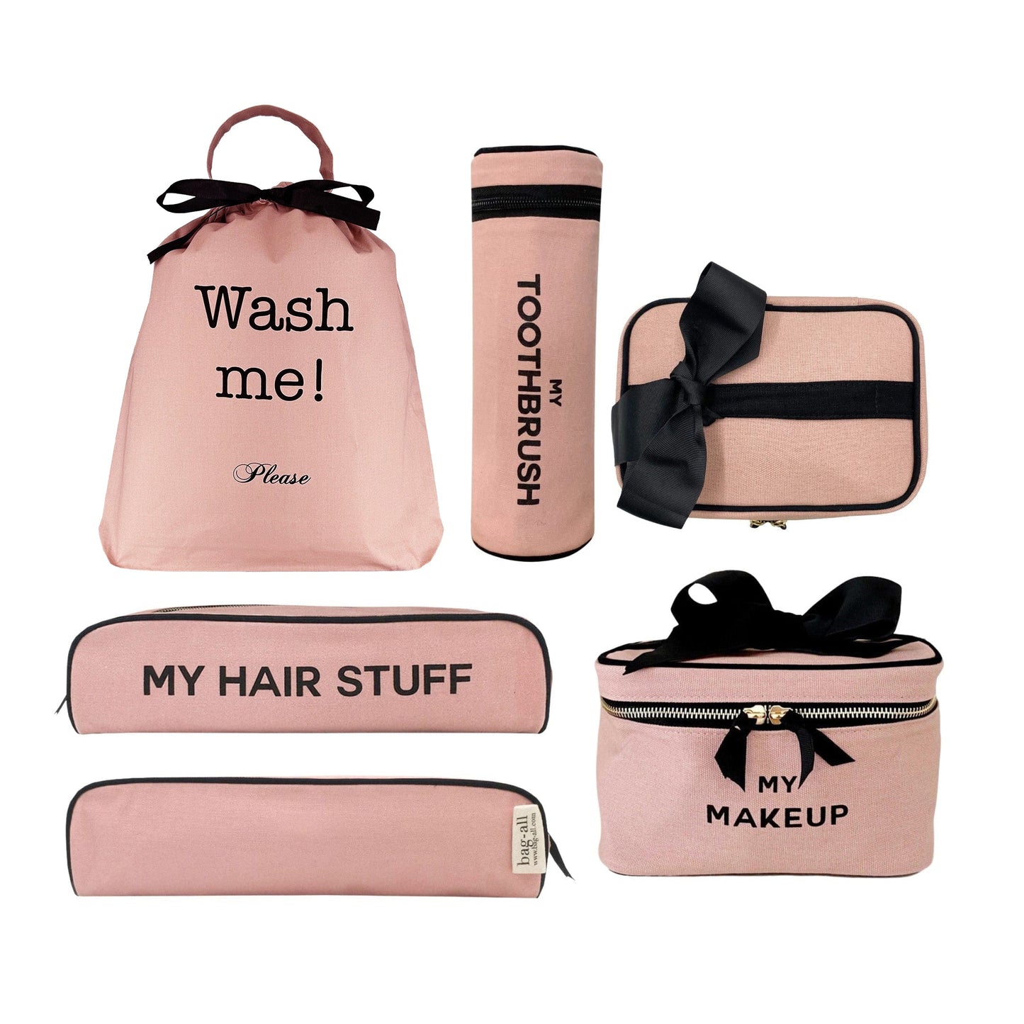 Bag-all Ultimate Gift Set featuring pink cotton travel cases including Wash Me laundry bag, makeup box, hair stuff case, and toothbrush holder with black bow accents and striped lining