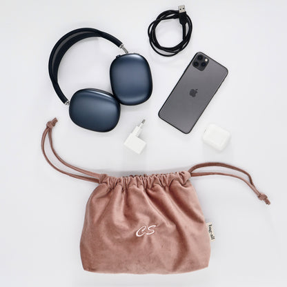 Bag-all pink eco velvet drawstring pouch holding tech essentials headphones charger cables organizer