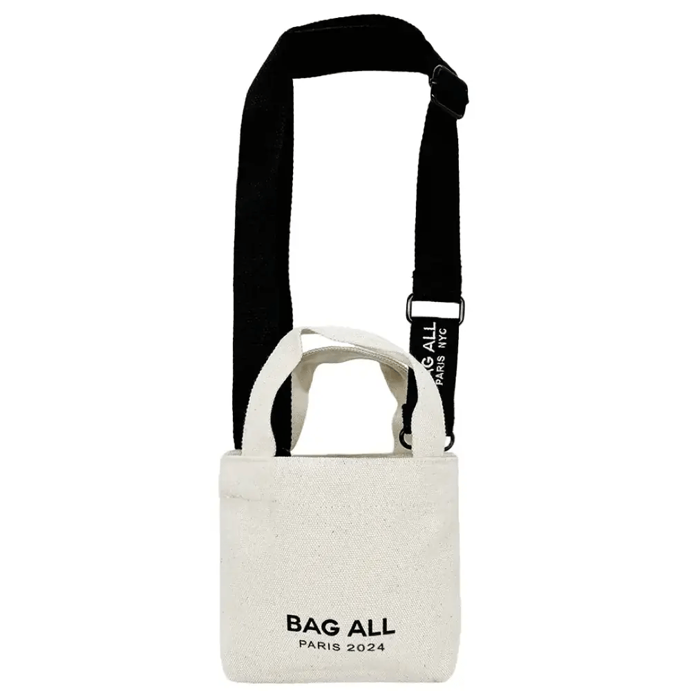 Bag-all Mini Tote Bag in cream cotton with black adjustable strap, interior pocket and brand logo detail - compact eco-friendly design for everyday use