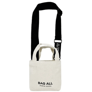 Bag-all Mini Tote Bag in cream cotton with black adjustable strap, interior pocket and brand logo detail - compact eco-friendly design for everyday use