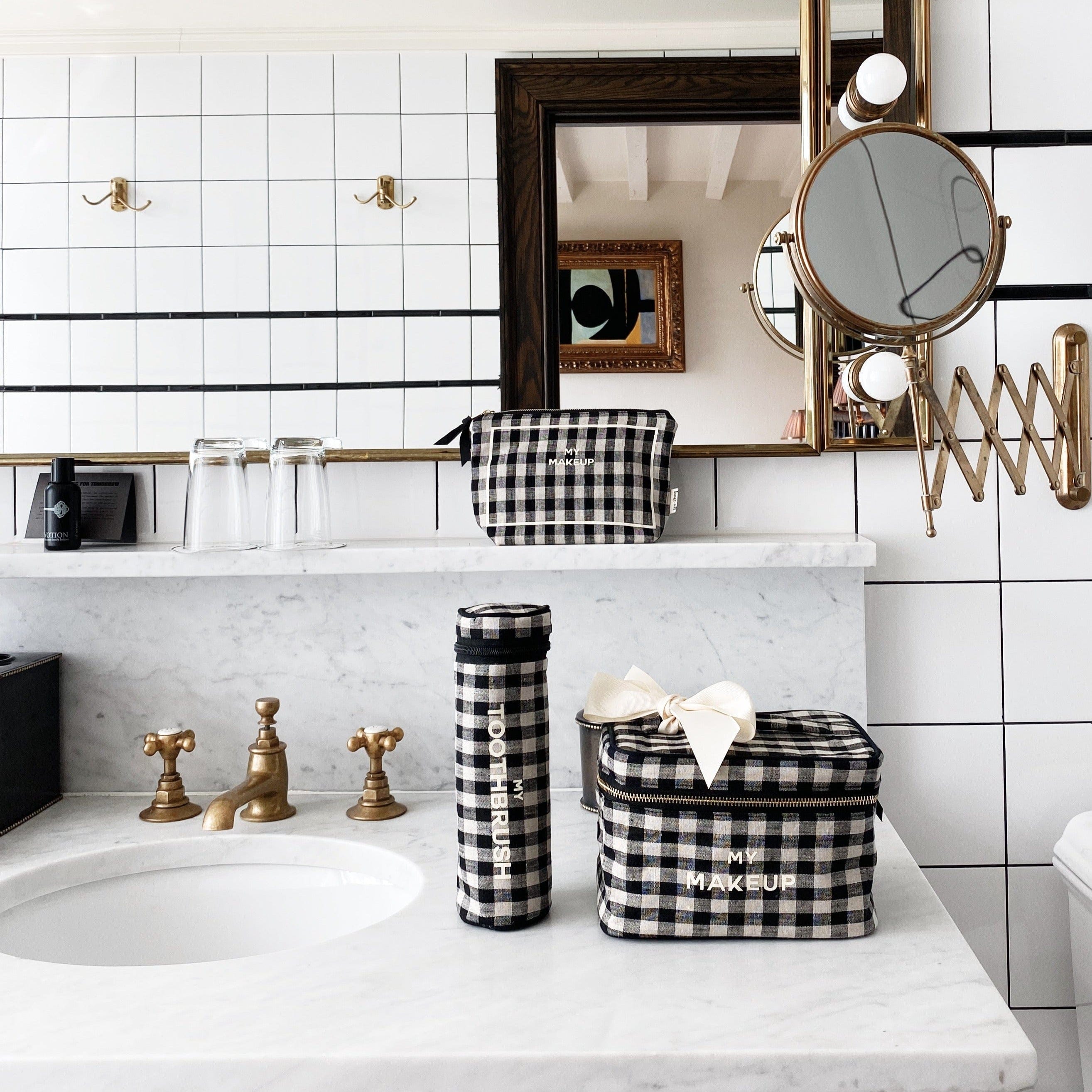 Best Makeup Bag – Gingham cotton travel organizer set in classic black and white checks, personalized for stylish packing by Bag-all Paris design.