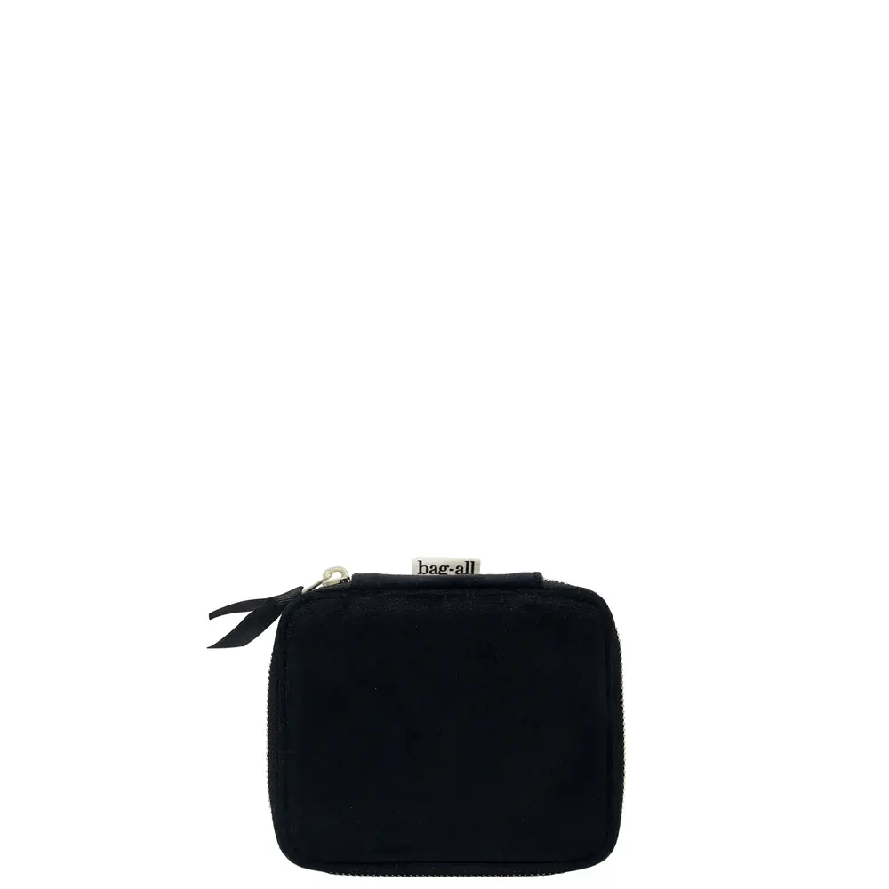 Compact black velvet Bag-all jewellery organizer case with zipper and logo tag on white background