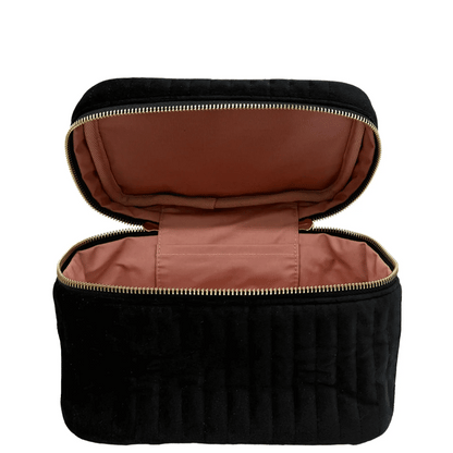 Open black eco-velvet Bag-all makeup and jewelry case with gold zipper and soft pink interior lining