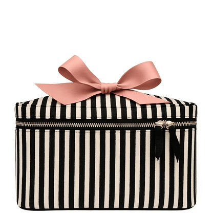 Striped Bag-all medium makeup and toiletry case with gold zipper and pink bow on white background