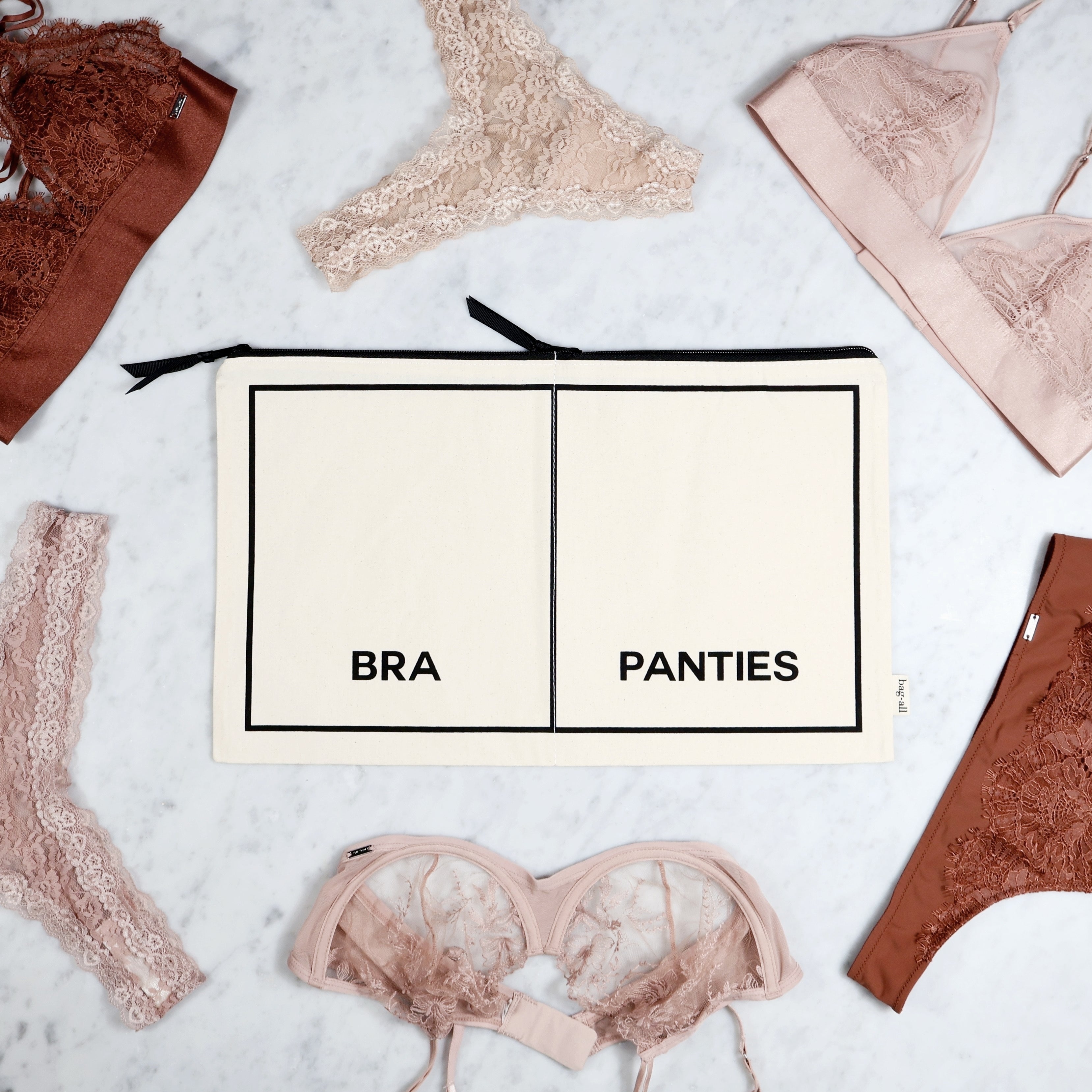 Bag-all cream double underwear organizer with separate bra and panties compartments for easy storage and travel organization