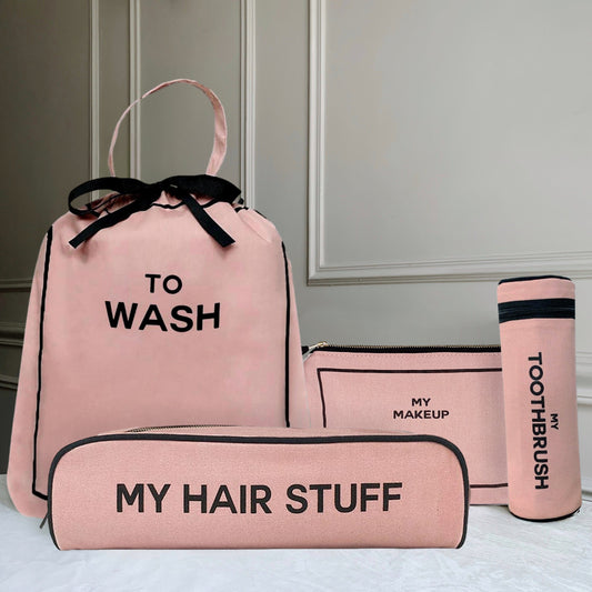 Bag-all pink cotton travel organizer set featuring 'To Wash', 'My Hair Stuff', 'My Makeup' and toothbrush cases with black text and bows, perfect for toiletry organization