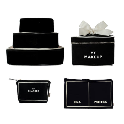 Travel Glam 4-Pack with black cotton bags for makeup, chargers, lingerie, and packing cubes by Bag-all