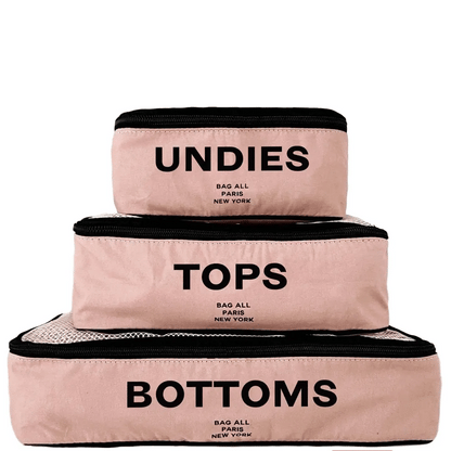 Bag-all Cotton Packing Cubes in Pink/Blush, set of 3 sizes with mesh top panels for visibility, featuring Undies, Tops and Bottom text labels, perfect for organized travel and storage