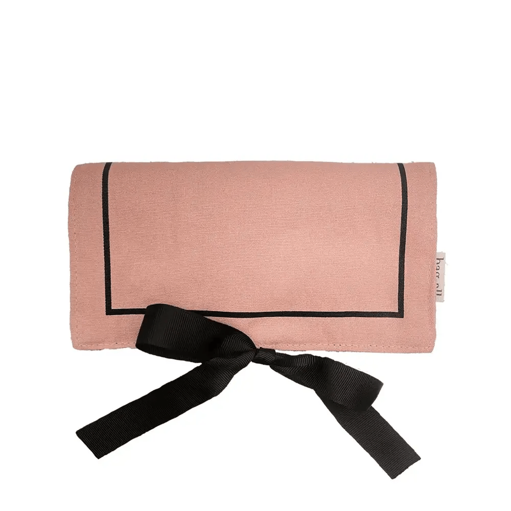 Pink blush Bag-all jewelry roll with black trim and ribbon tie for travel and jewelry organization