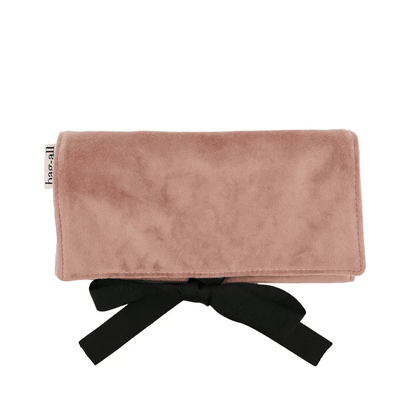 Pink eco velvet jewelry case with black ribbon tie, compact travel organizer by Bag-all on white background