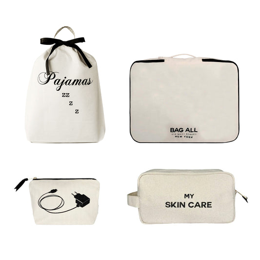 Bag-all Essentials Getaway 4-Pack featuring cream cotton organizers: Pajamas bag with bow, packing cube, tech charger pouch, and skincare toiletry case for stylish travel organization