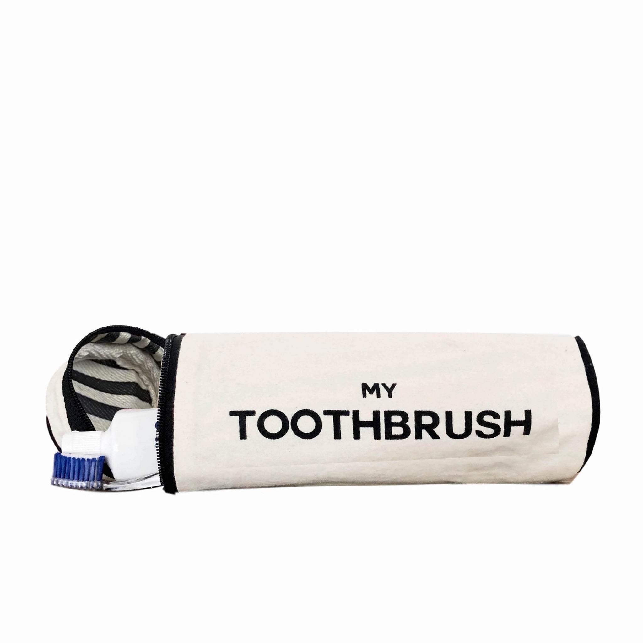 Bag-all Cream Toothbrush Travel Case featuring cylindrical design with 'My Toothbrush' text, black trim, and zebra-print lining, perfect for organizing dental essentials
