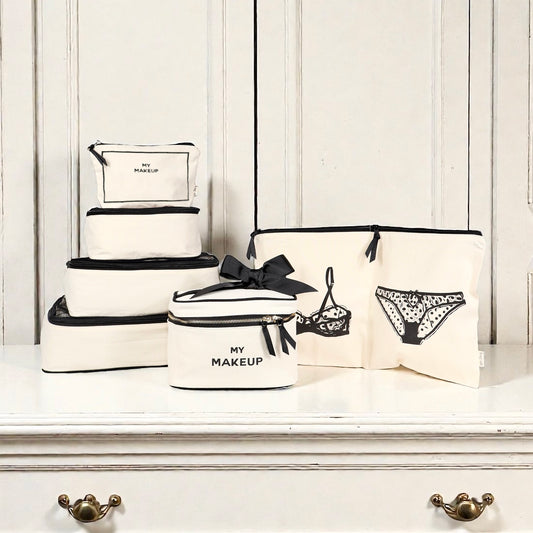 Cream Bag-all Travel Glam 4-Pack with makeup, lingerie pouches and packing cubes in gallery position one display