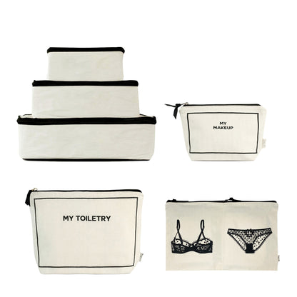 Cream Bag-all Weekend Essential Packing Set 4-pack with labeled toiletry, makeup, and lingerie bags in gallery position one