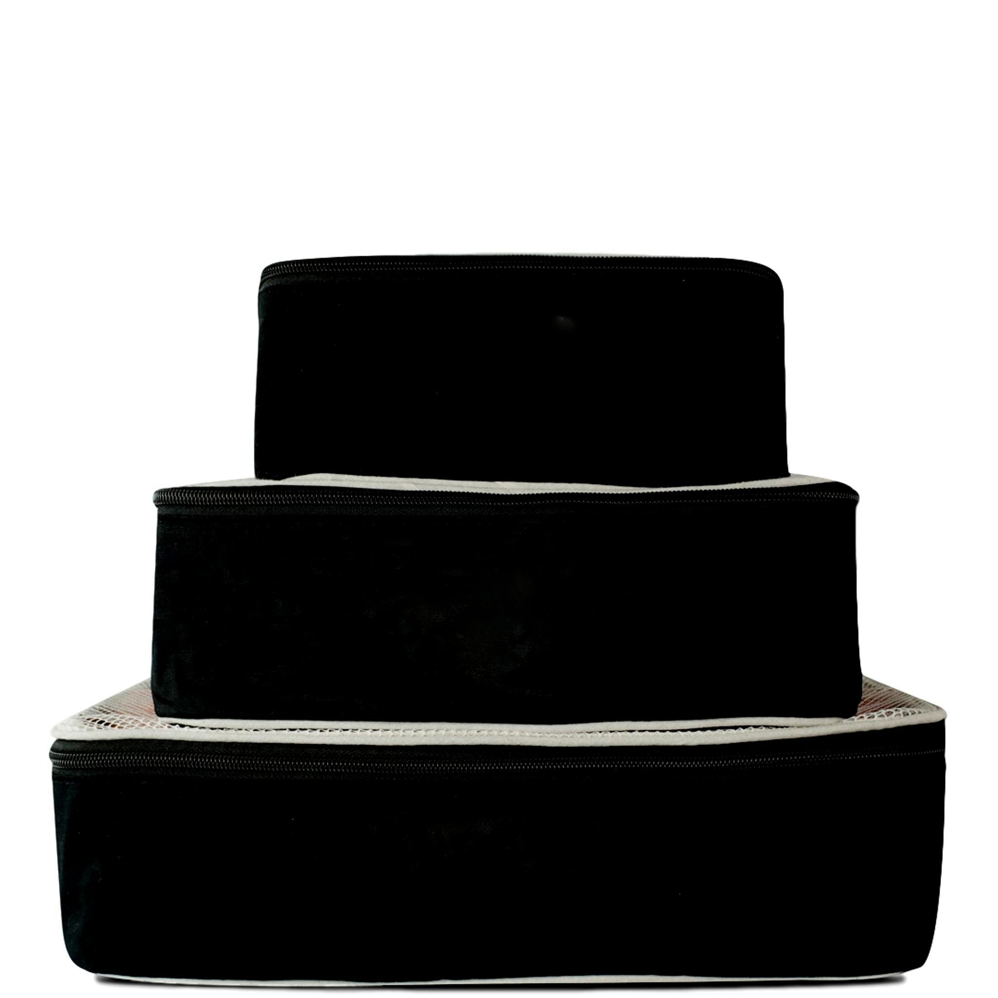 Bag-all Travel Glam 4-Pack in black cotton featuring stackable organizers for lingerie, makeup, tech, and clothing - sleek travel essentials with white trim detail