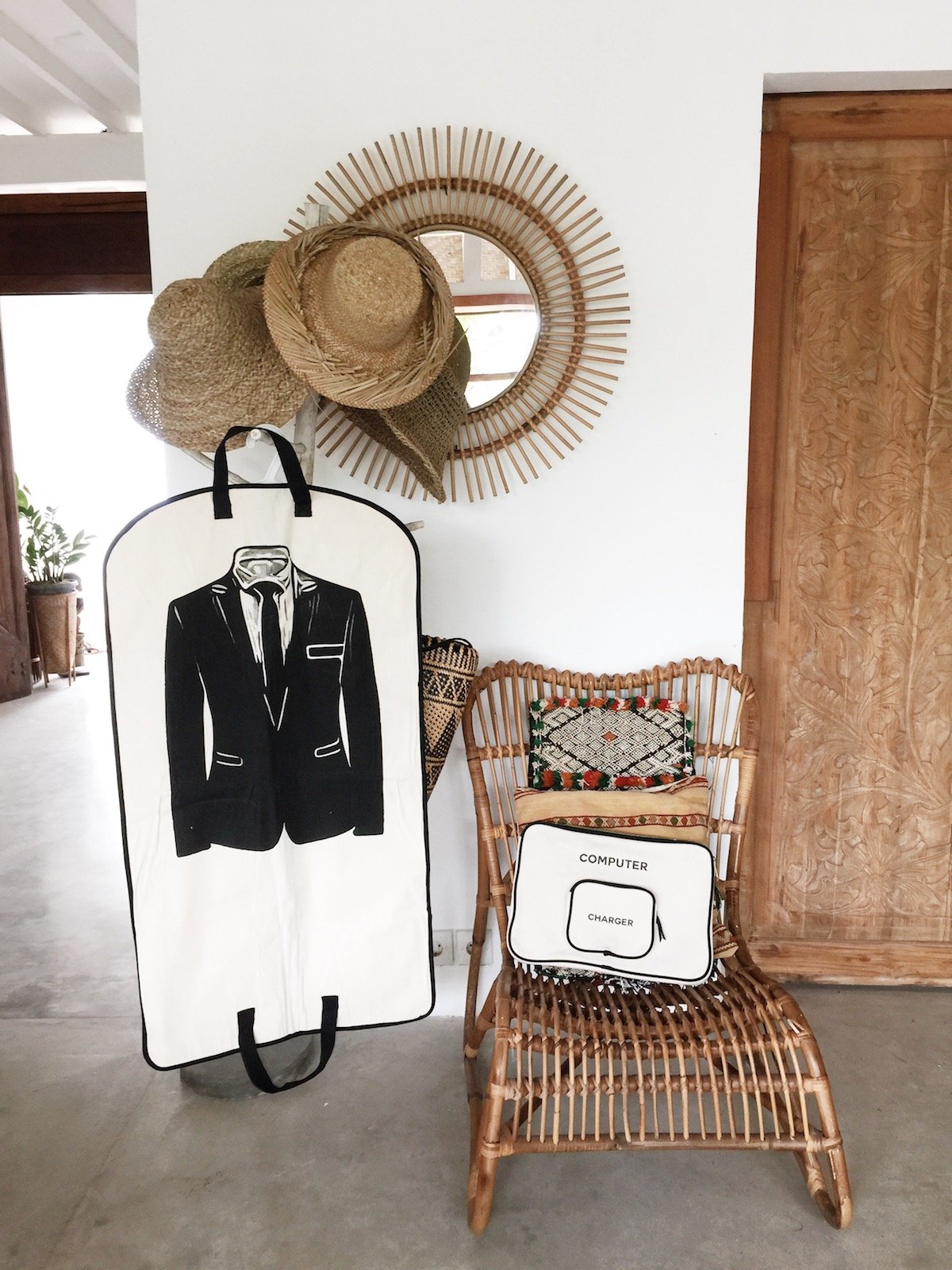 Bag-all Men's Suit Garment Bag with Pocket in cream features black suit graphic, dual handles, zippered storage pocket, perfect for travel and closet organization