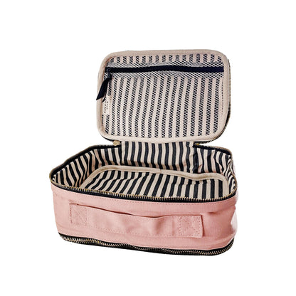 Bag-all Double Sided Multi Use Case in Pink/Blush featuring striped interior, dual compartments with elastic straps, mesh pocket and carrying handle for organized storage