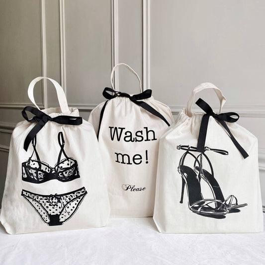 Bag-all Deal Gift Set featuring three white cotton organizing bags with black ribbon ties - lingerie bag, wash me bag, and high heel shoe bag with stylish black prints