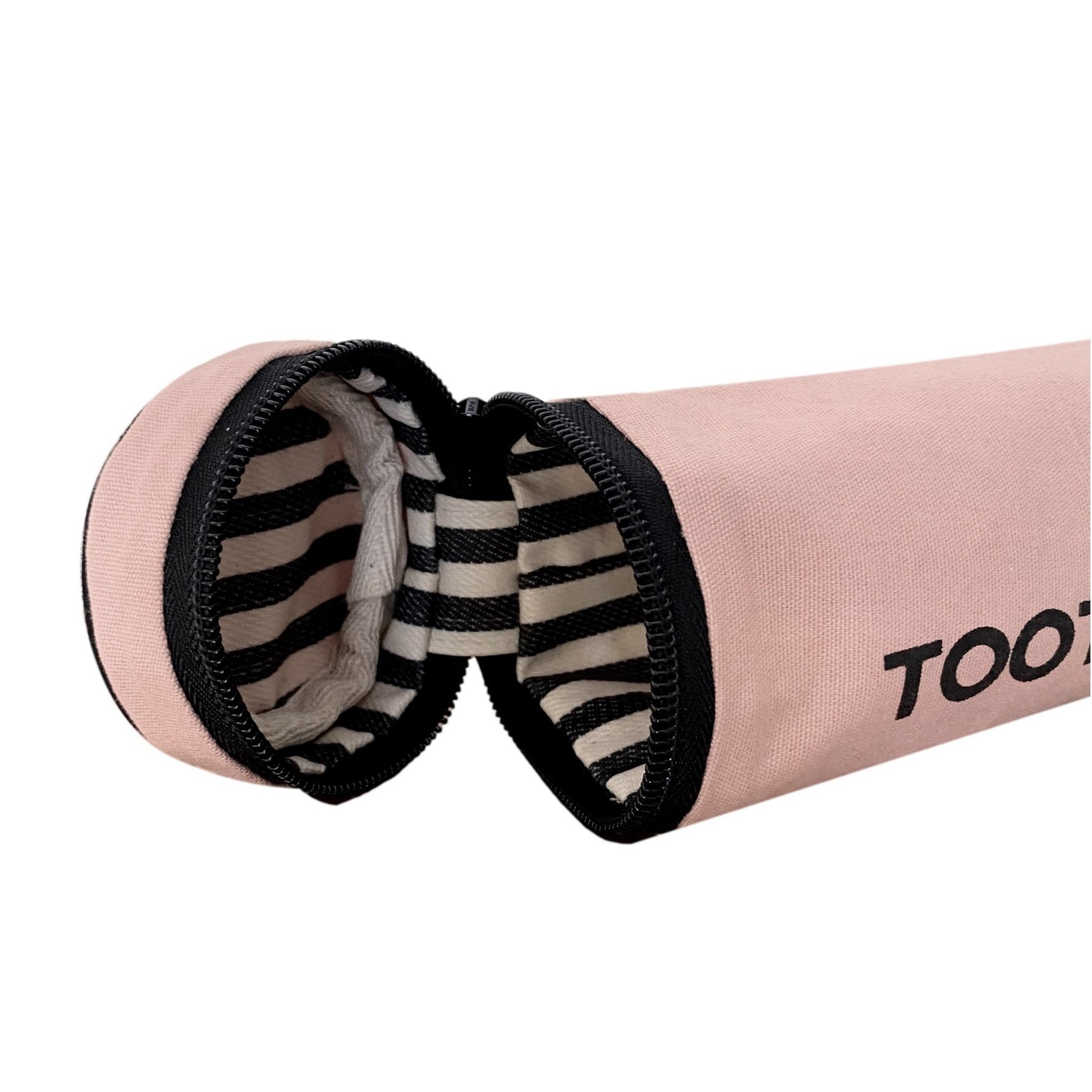 Bag-all Pink Toothbrush Travel Case featuring striped interior lining, spacious compartment for multiple toothbrushes and toothpaste, perfect for travel organization and bathroom storage