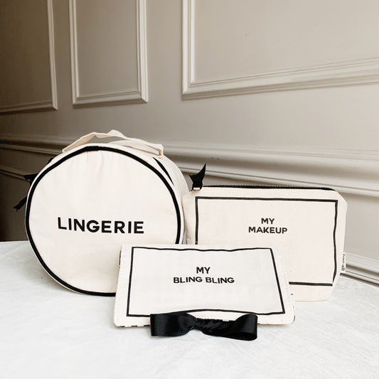 Bag-all Deal Gift Set for Her cream cotton organizer cases featuring lingerie, makeup, and jewelry storage with black text and bow detail on elegant white background