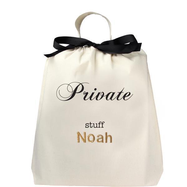 Bag-all customizable Private Stuff organizer bag with monogram personalization in gold, featuring elegant black ribbon tie closure and white cotton construction