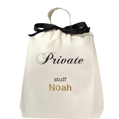 Bag-all customizable Private Stuff organizer bag with monogram personalization in gold, featuring elegant black ribbon tie closure and white cotton construction