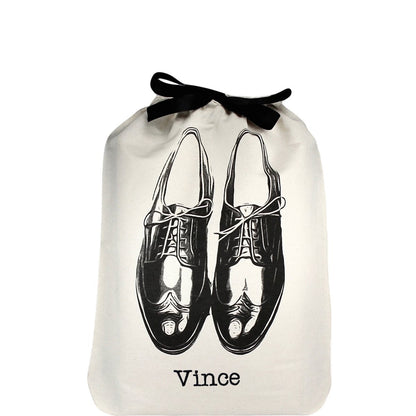 Bag-all Men's Shoe Bag in cream with black vintage oxford shoe illustration and black ribbon tie closure, featuring personalized monogram Vince