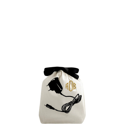 Bag-all Cream Charger Bag with black bow and gold monogram, featuring charger cord illustration, perfect for organizing cables and cords