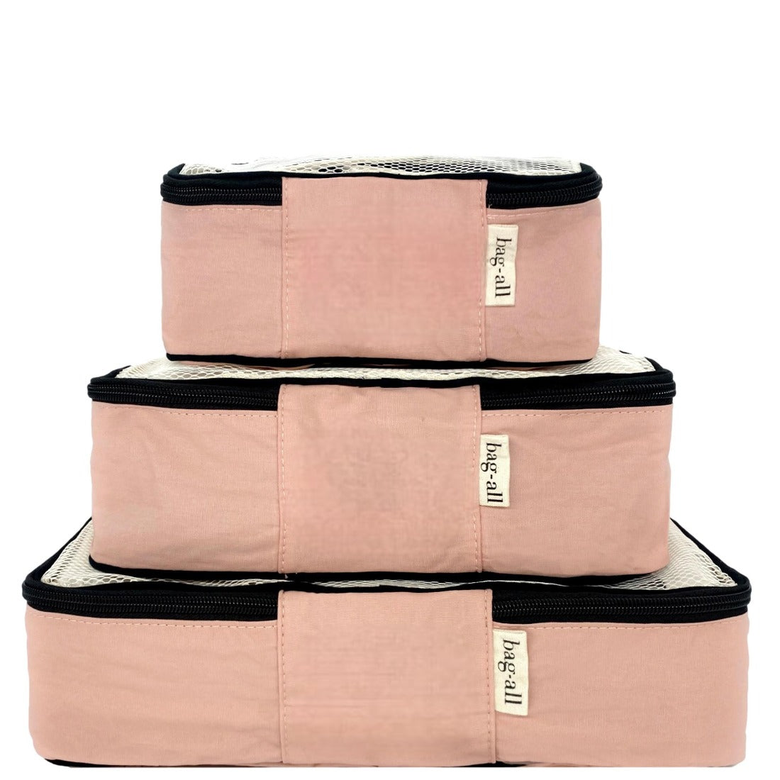 Bag-all Cotton Packing Cubes 3-pack in Pink/Blush with mesh top design and black zippers, stacked to show varying sizes for organized travel storage and easy packing