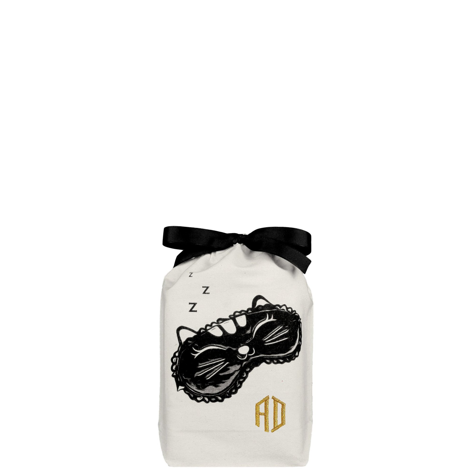 Bag-all Sleeping Beauty cotton organizer bag with black cat sleep mask design and gold monogram, featuring elegant black bow closure